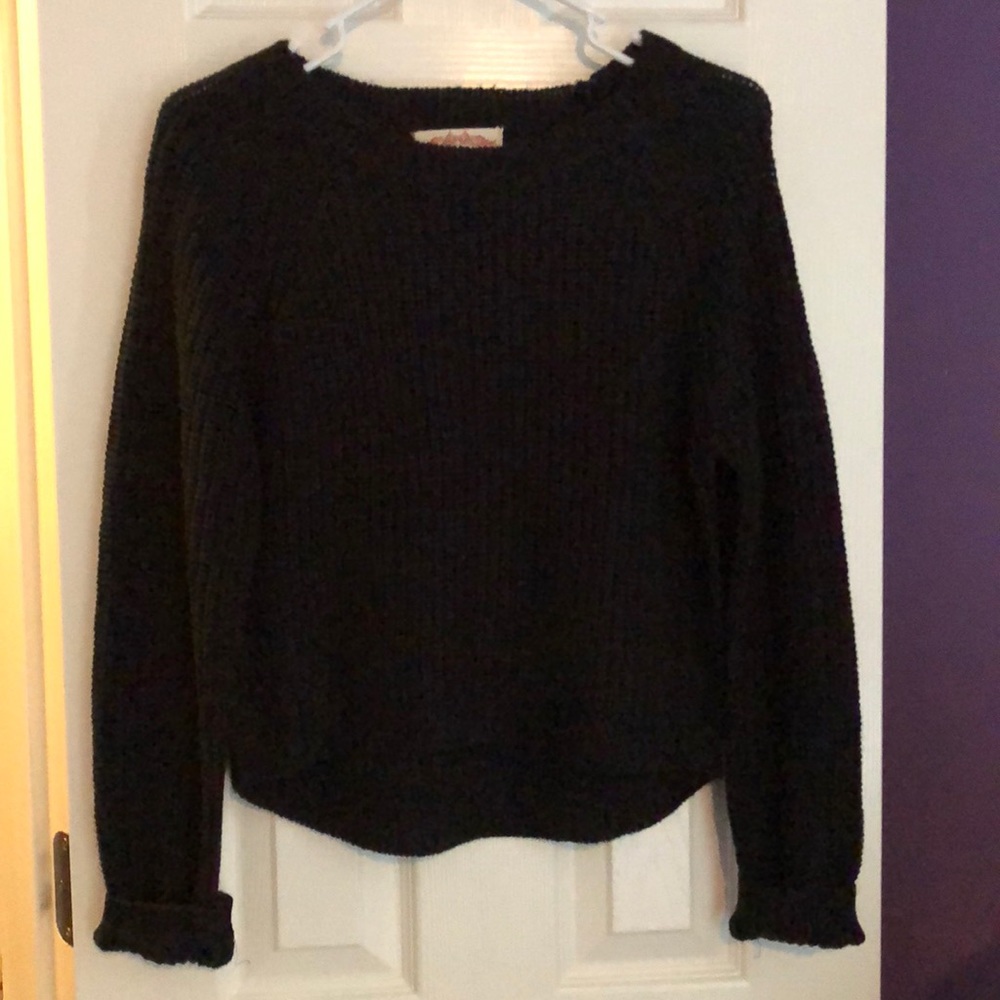 a black cropped sweater